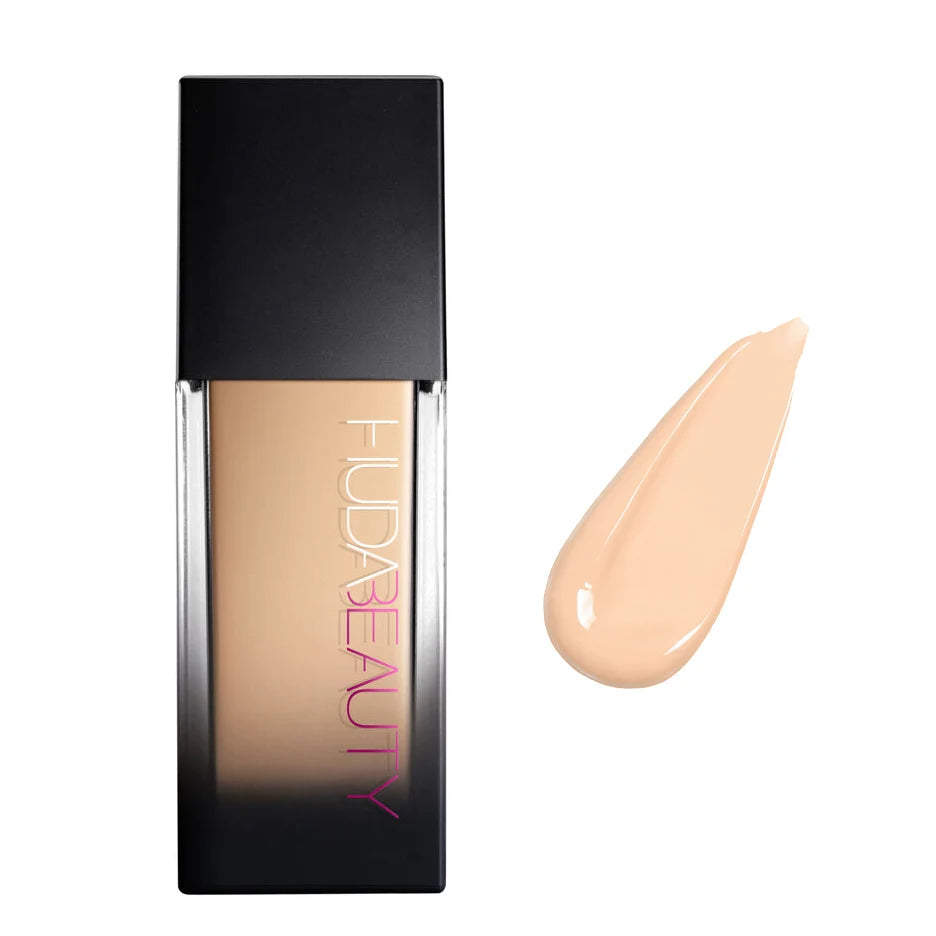 Huda Cosmetics – Base Líquida de Alta Cobertura e Longa Duração.